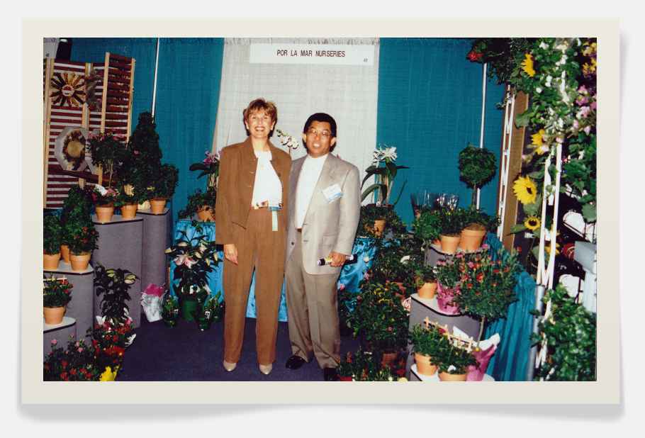 Pat Caird representing Por La Mar Nursery at a trade show in the 1980s